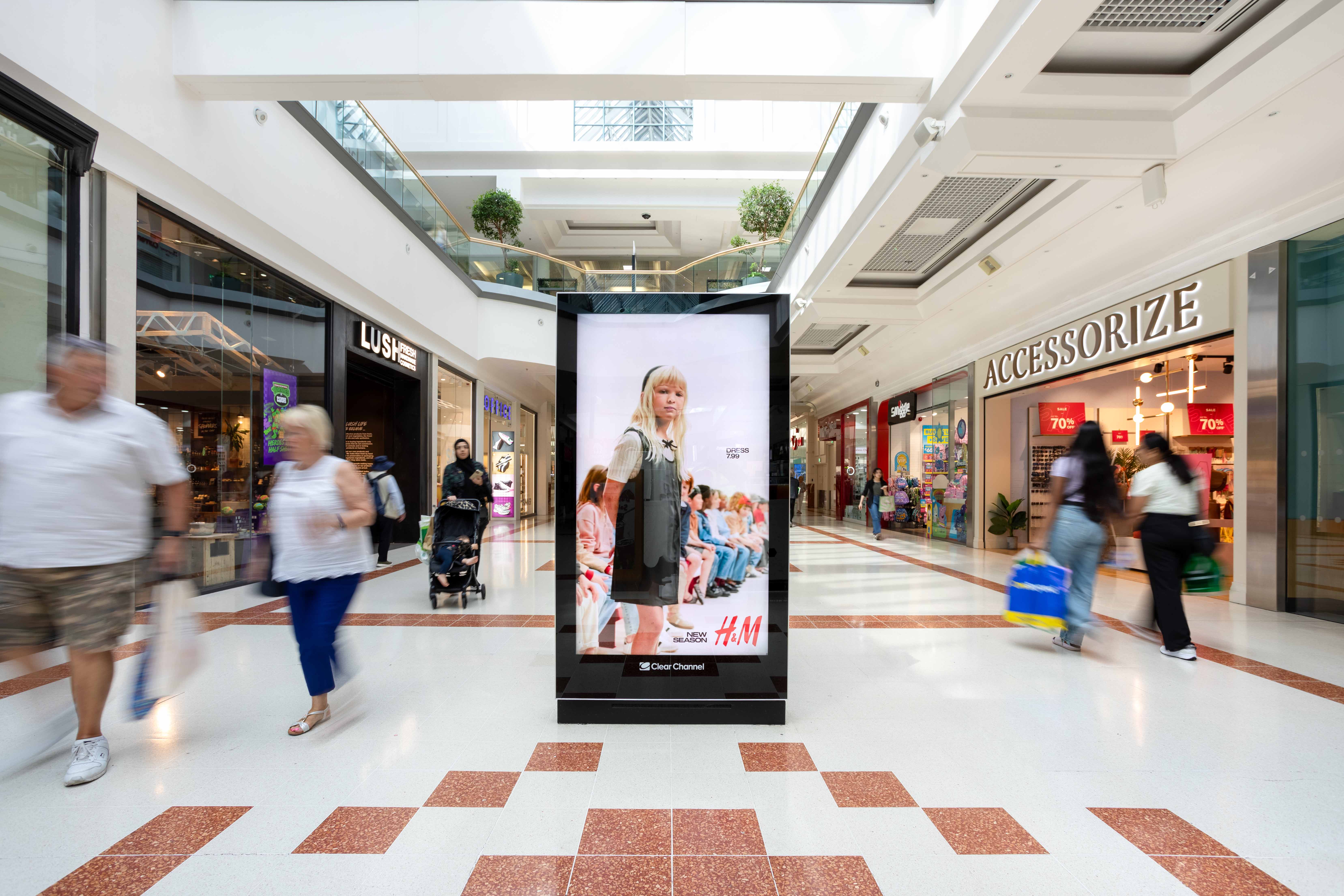 A digital screen in a shopping mall