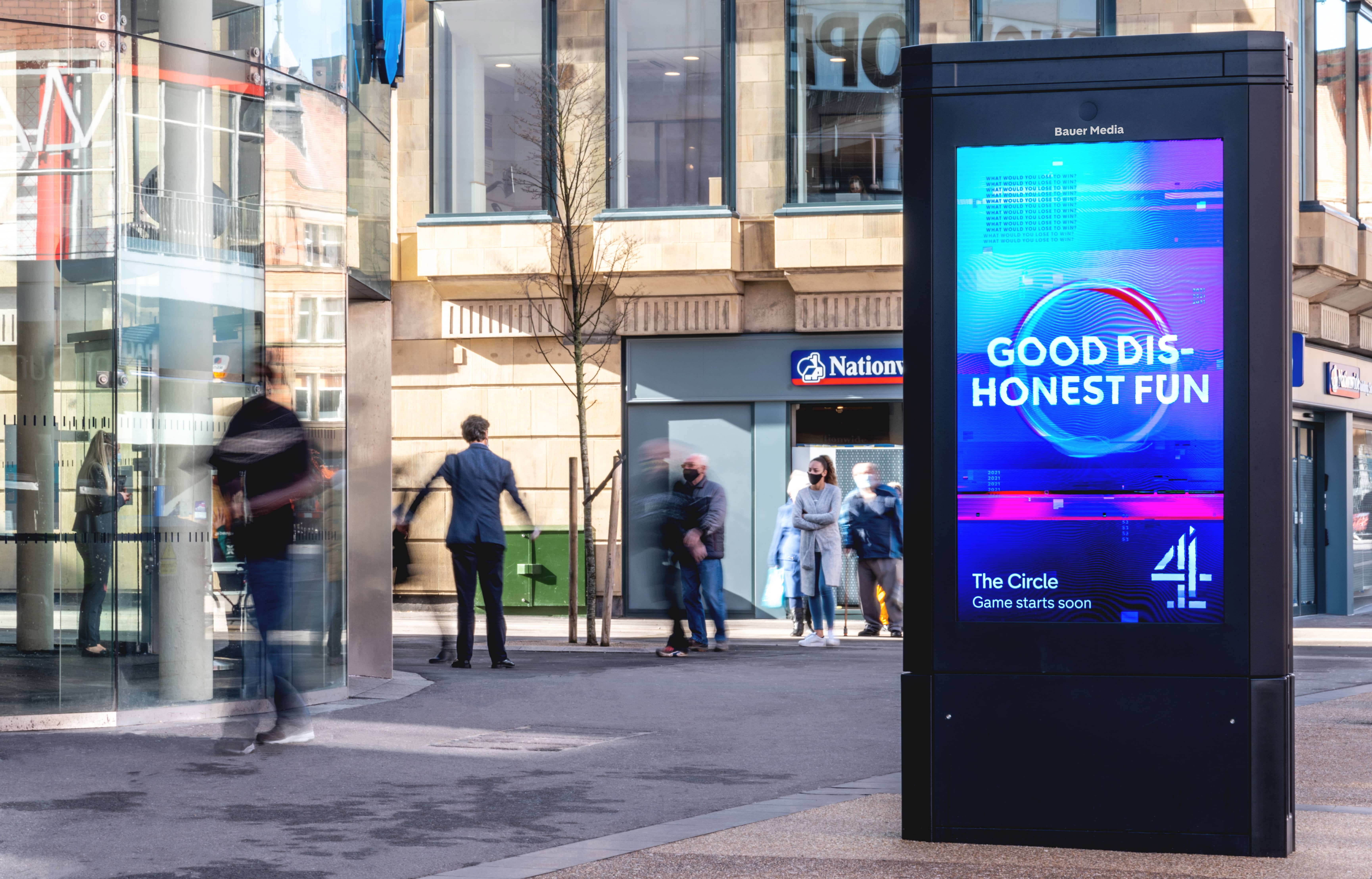 Digital screen outside Nationwide showing Advert for Ch4 The Circle