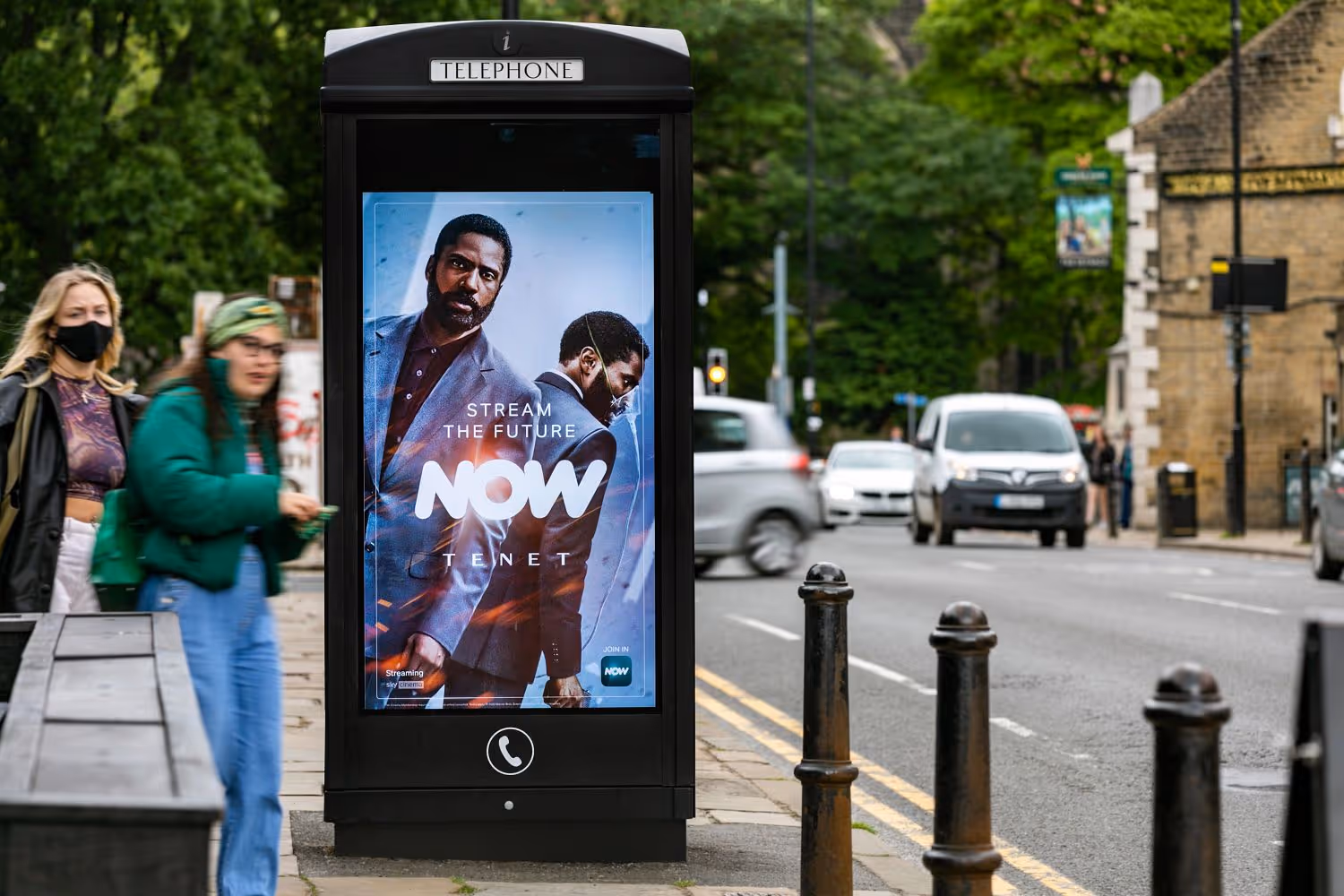 Now TV Tenet ad on digital phone kiosk screen