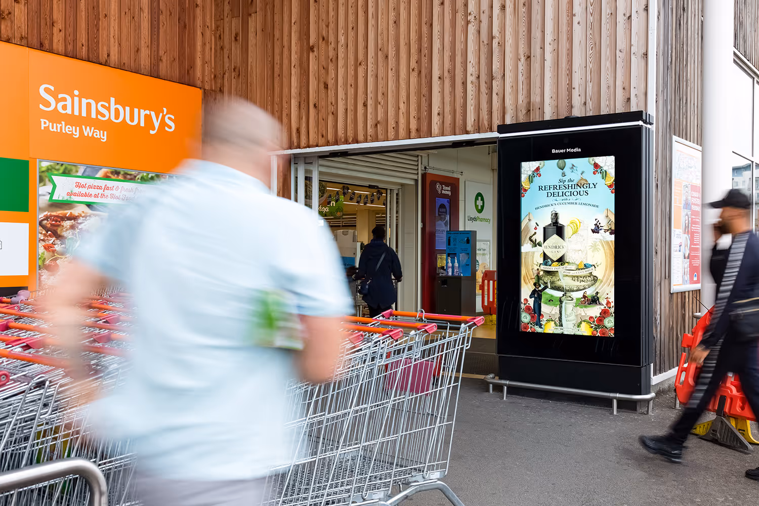 Sainsbury's Live digital advertising panel at the supermarket entrance