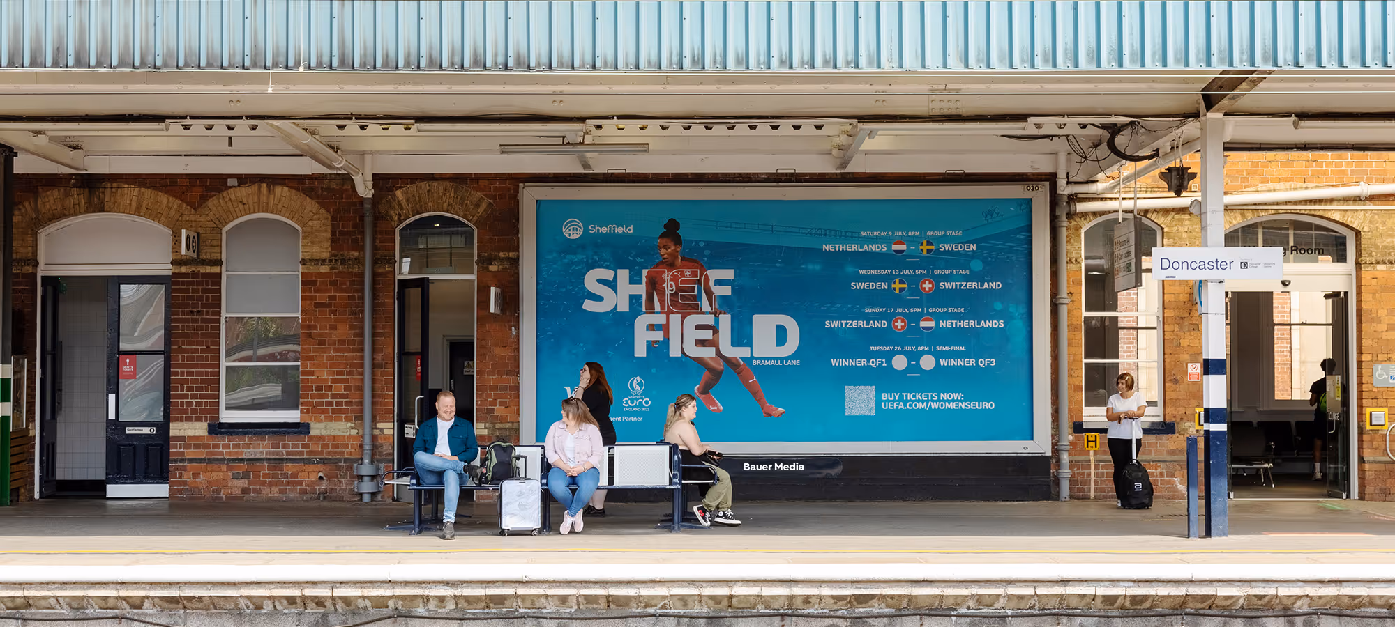 Station Billboard on a train station platform