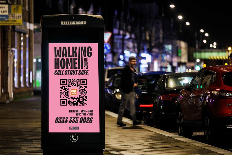 Digital screen promoting Strut Safe service to help people feel safer at night