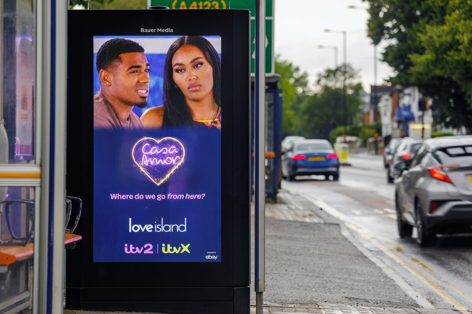 ITV ad on an Adshel Live screen on a bus shelter