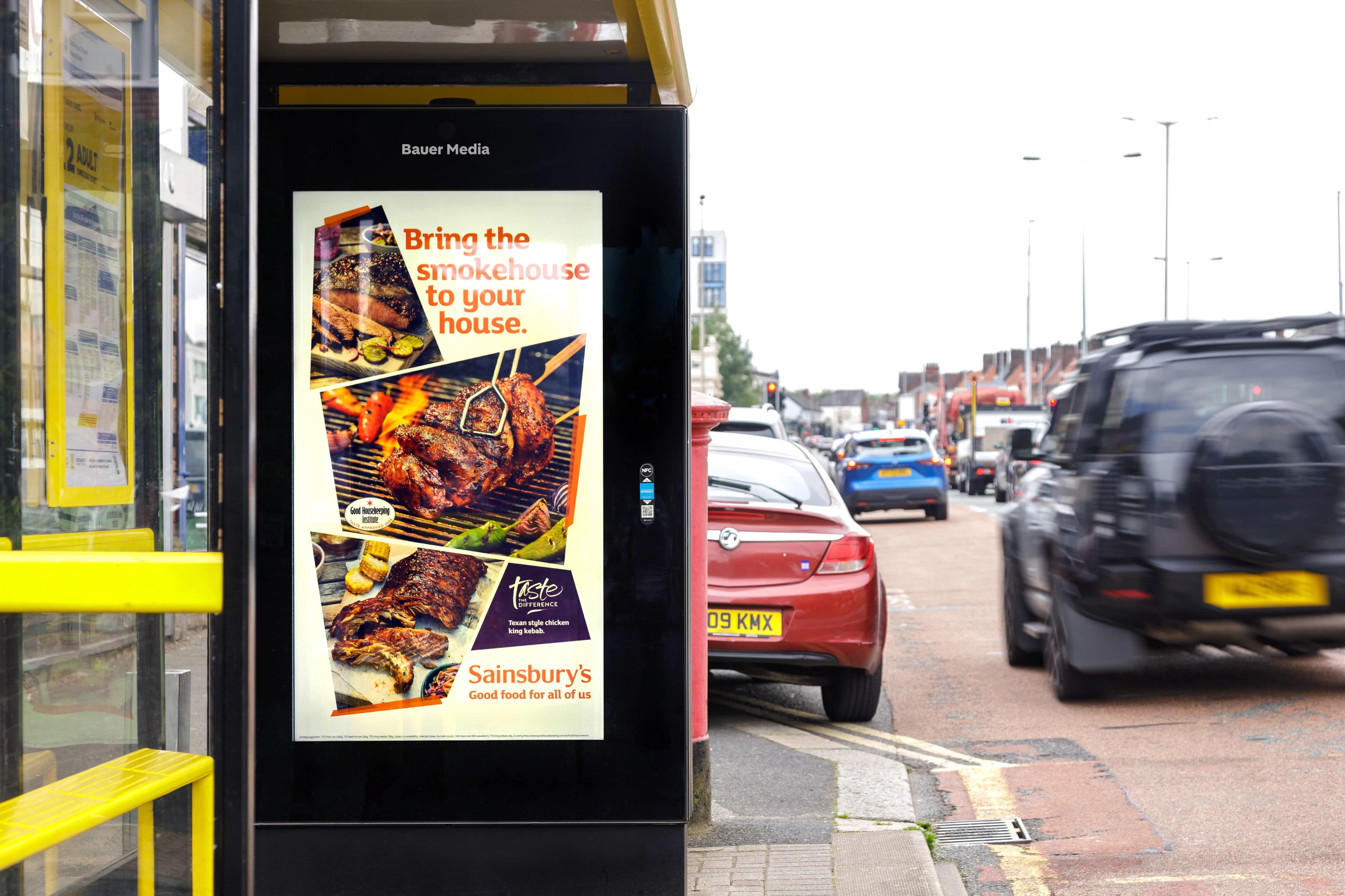 Sainsburys ad on an Adshel Live screen on a bus shelter