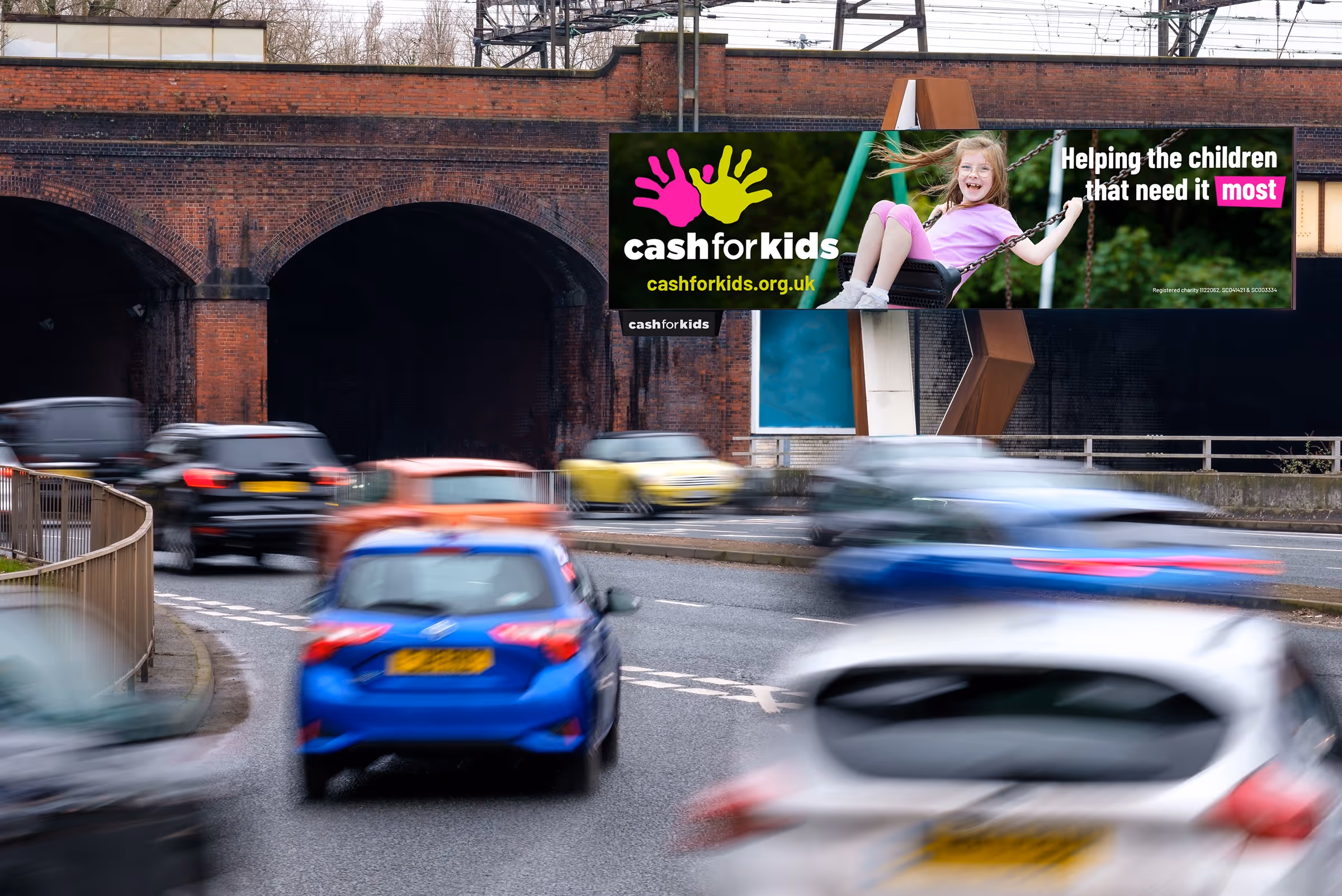 Cash For Kids charity poster on a Bauer Media Outdoor digital billboard