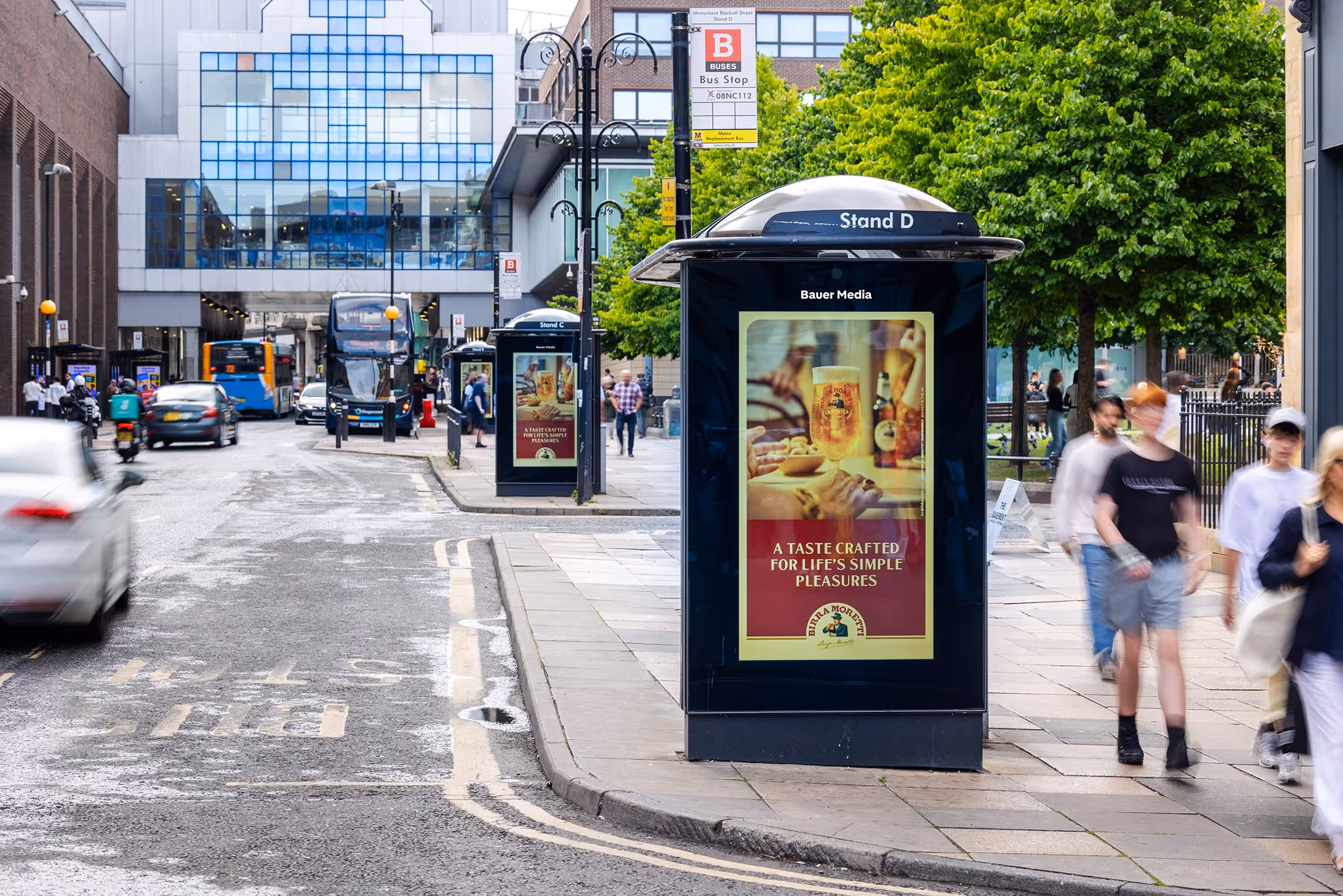 Roadblock activation displaying Birra Moretti campaign across DOOH screens