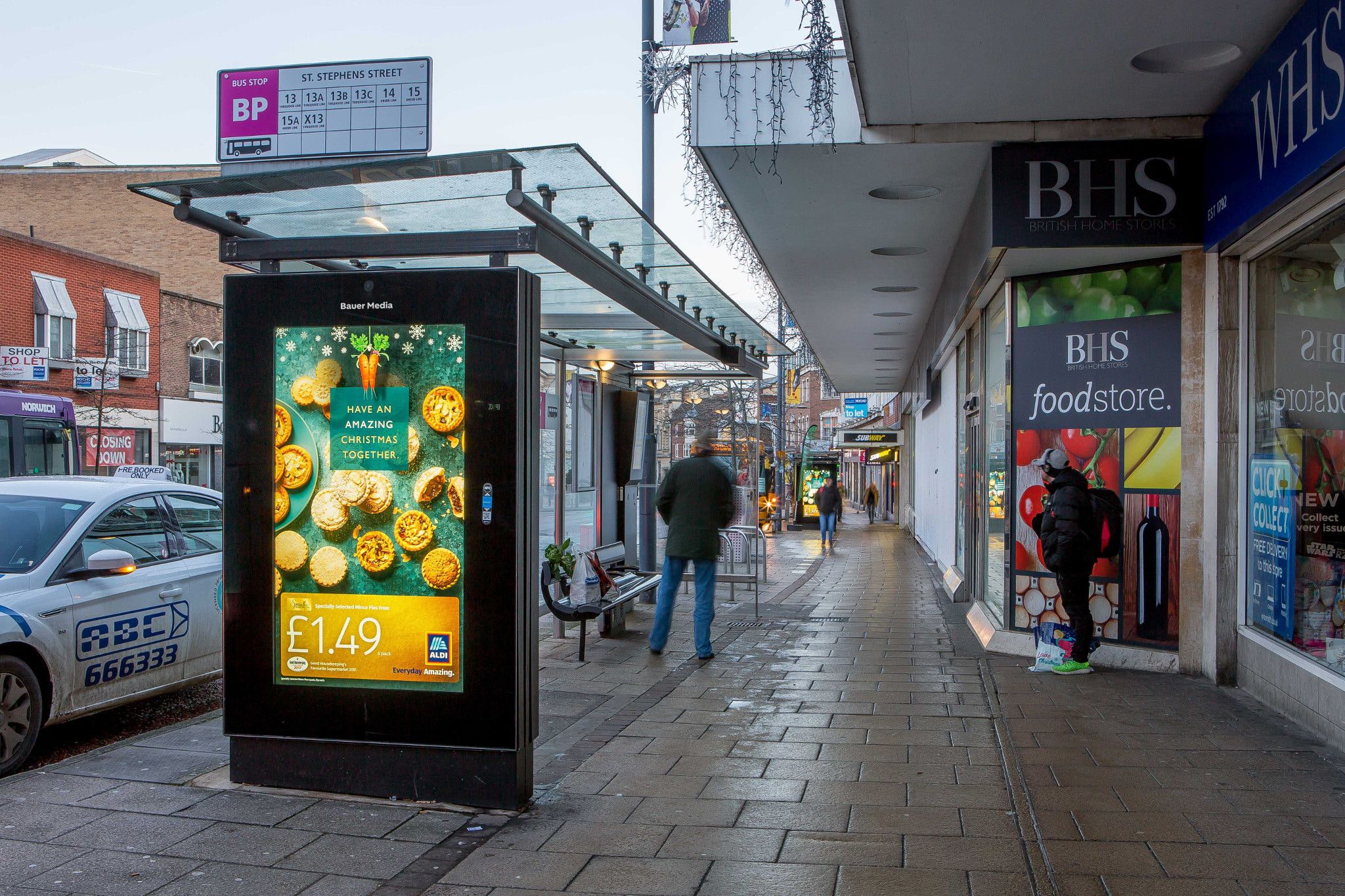 Aldi displaying an ad campaign on an Adshel Live screen