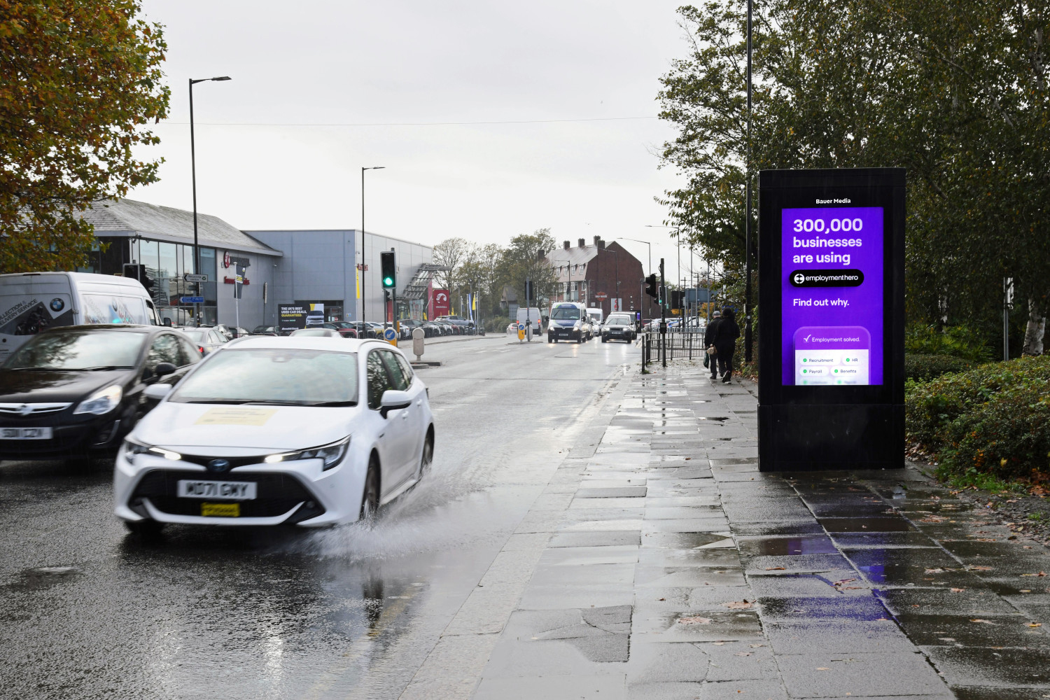 Employment Hero advertising on a digital bus shelter screen