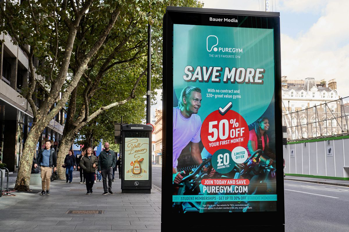 Pure Gym advertising on a roadside poster