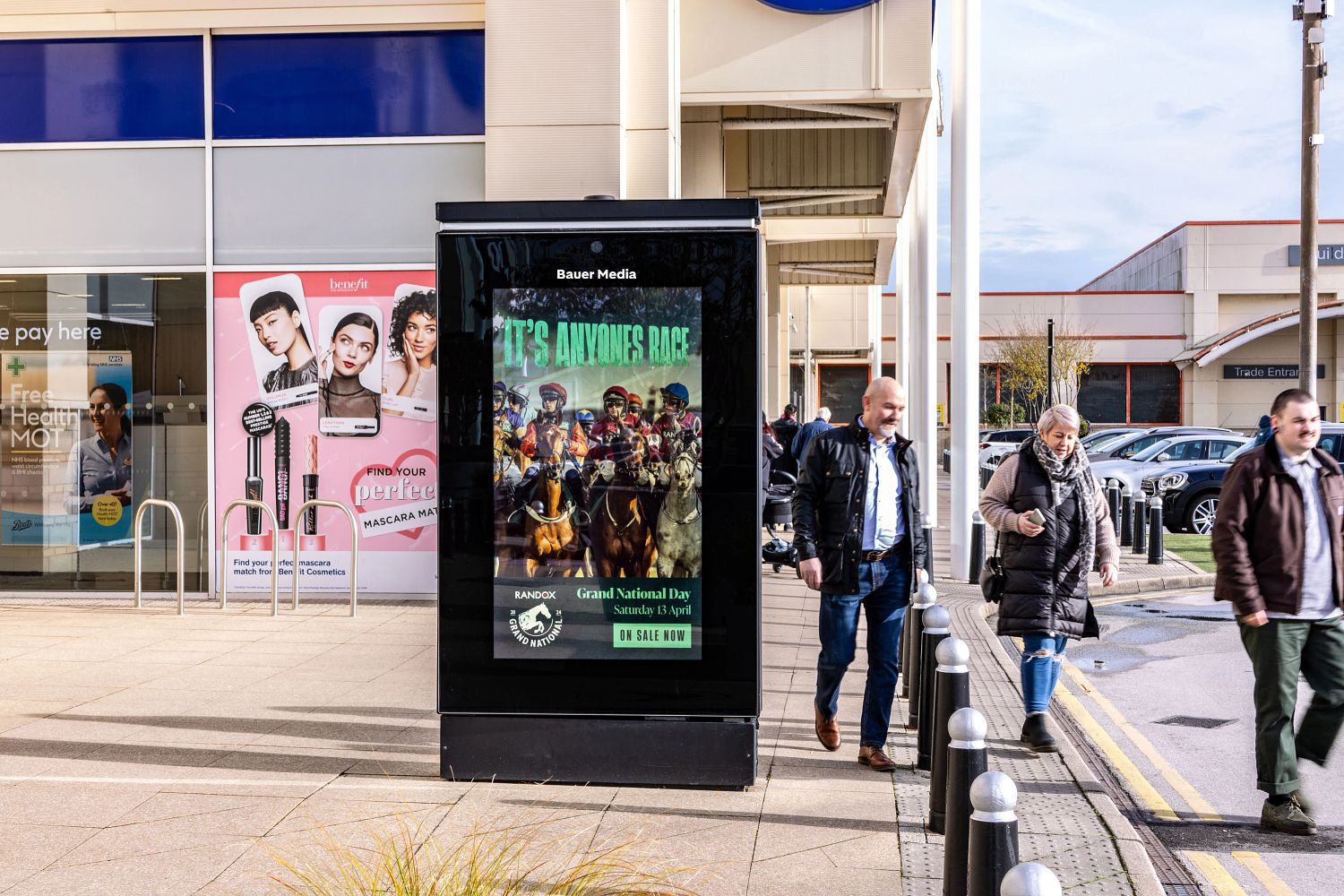 Jockey Club Racecourse advertising on a digital screen outdoors