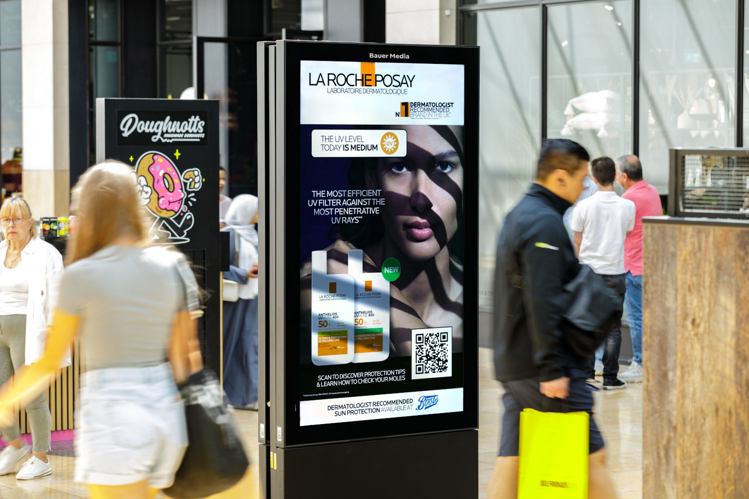 La Roche Posay advertising on a shopping mall digital screen