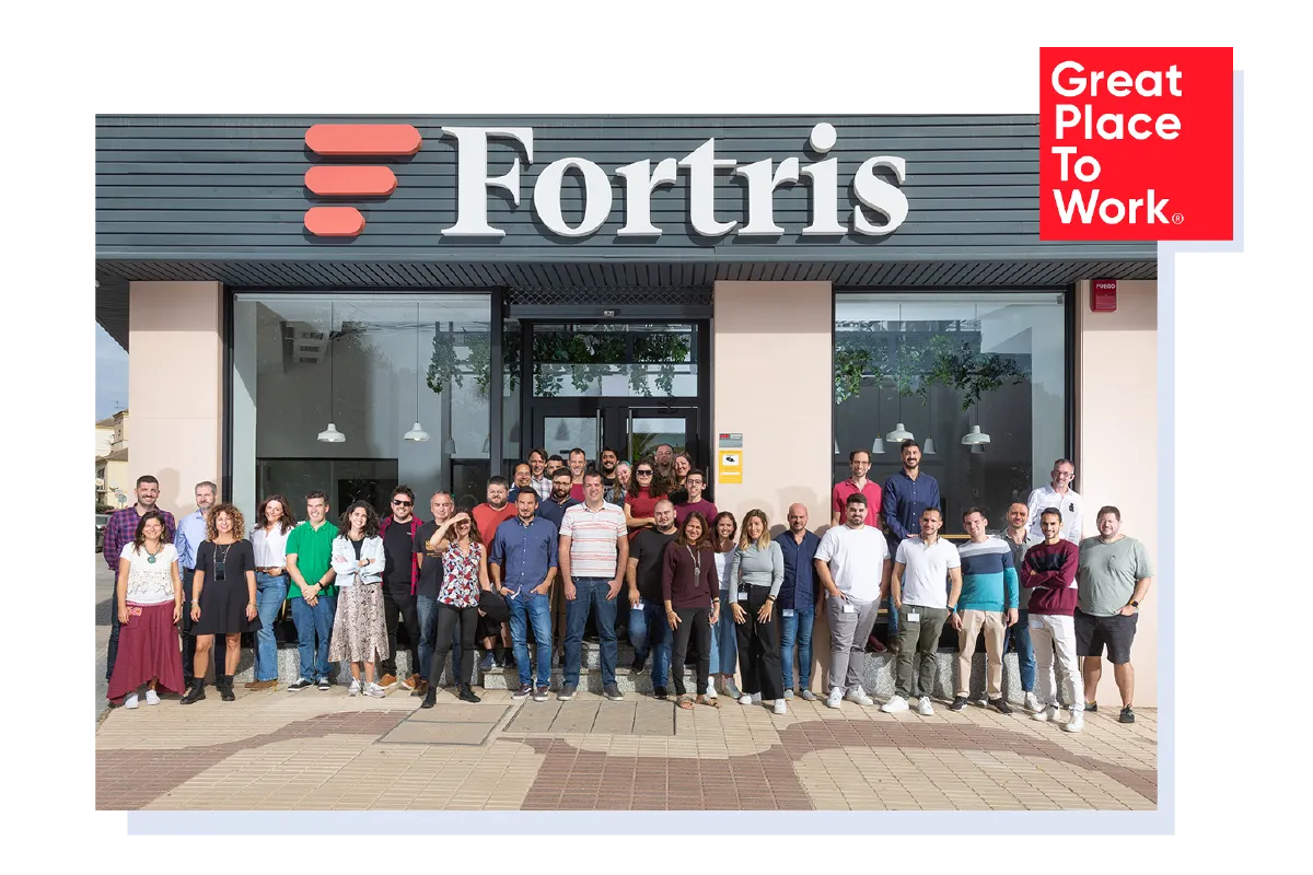 Team group photo taken outside the Fortris offices.