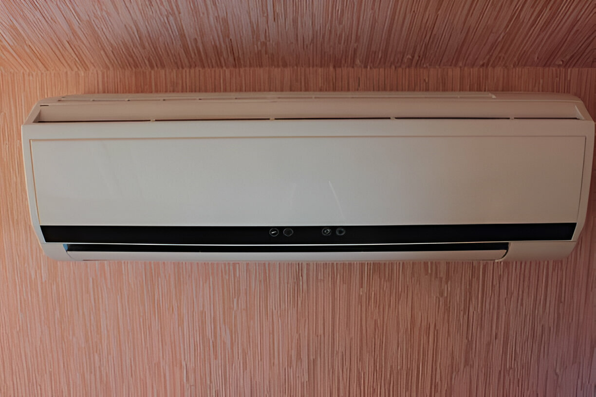 Wall-mounted air conditioning unit with white and black design