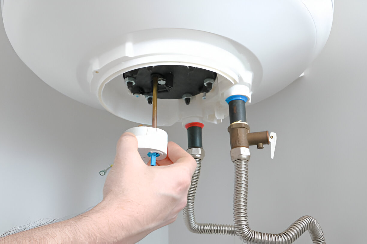 Hand adjusting water heater connections with metallic pipes