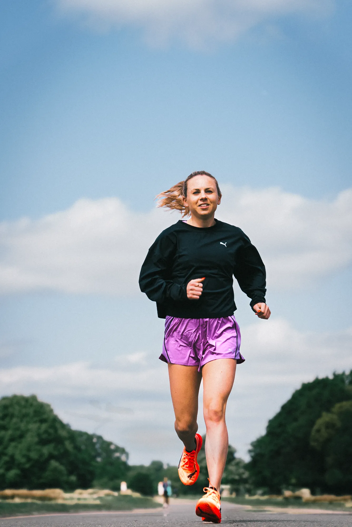 Charlotte Purdue running in pink shorts