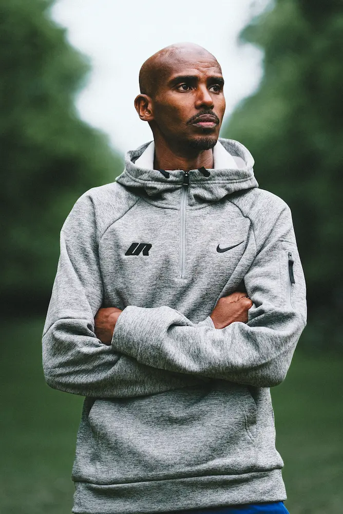 Sir Mo Farah crossing arms
