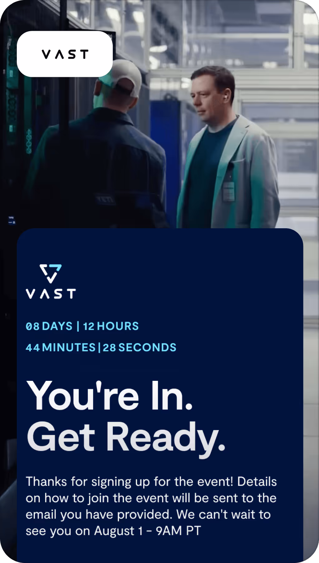 Two men, one in a lab coat and the other wearing a cap, standing in a modern industrial or tech setting with an overlay of VAST event countdown and confirmation text.
