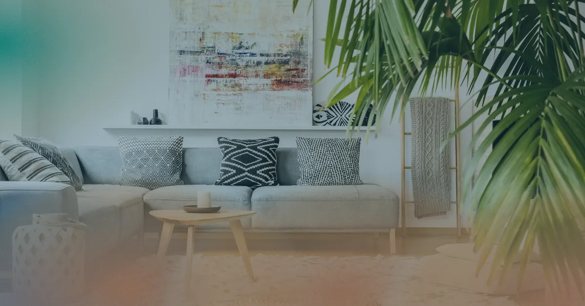 Modern stylish living room with light gray sofa and houseplant
