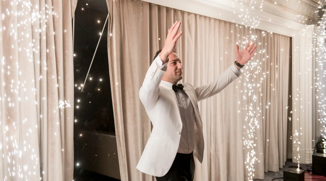 Wedding dance floor celebration with DJ entertainment