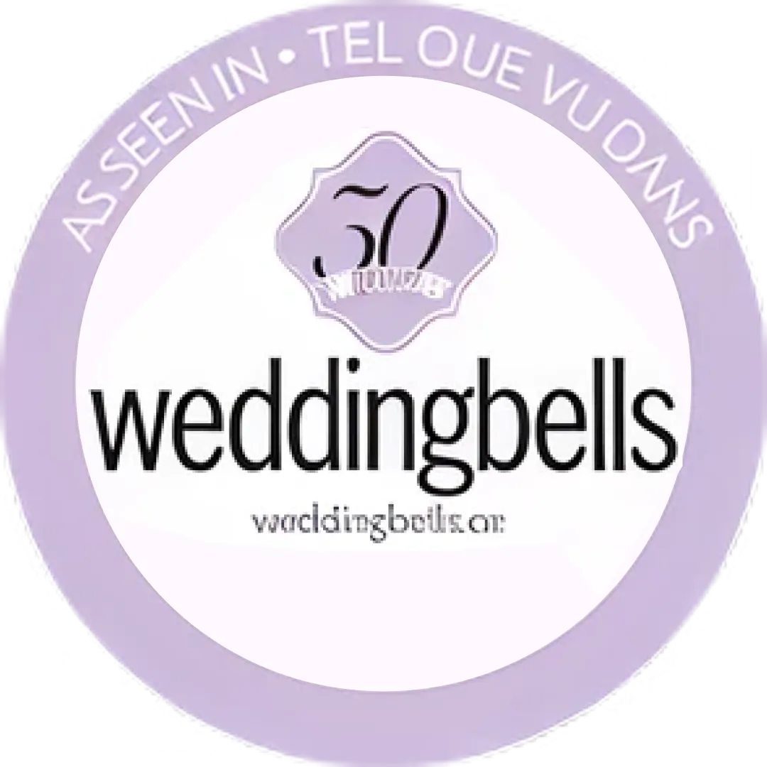 Weddingbells logo with 50th anniversary emblem and text 'As seen in • Tel Oue Vu Dans'.