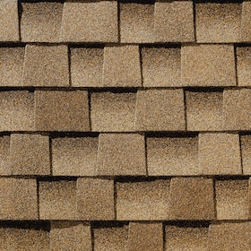 Close-up view of overlapping brown asphalt roof shingles arranged in horizontal rows.