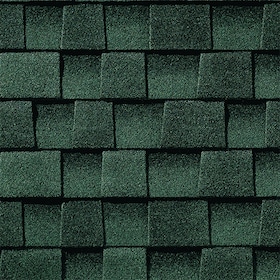Close-up of hunter green asphalt roof shingles arranged in a staggered pattern.