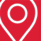 Red location pin icon with a circular center.