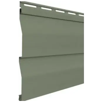 Close-up of green vinyl siding panel with interlocking edges.