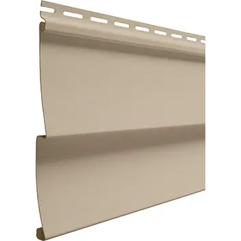 Close-up of a beige vinyl siding panel with locking tabs along the top edge.