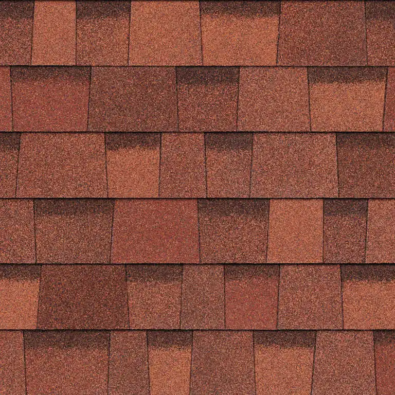 Close-up of textured terracotta-colored asphalt roof shingles arranged in horizontal rows.