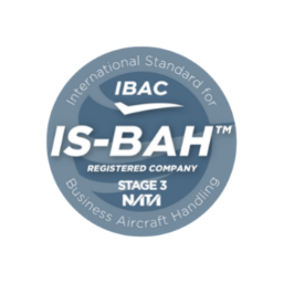 Round blue emblem with text 'IBAC IS-BAH Registered Company Stage 3 NATA International Standard for Business Aircraft Handling'.