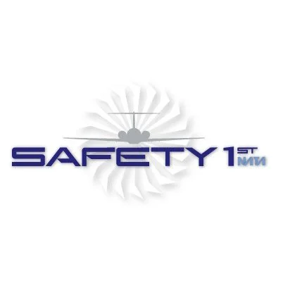 Safety 1st logo with blue text and a gray abstract gear-like shape in the background.