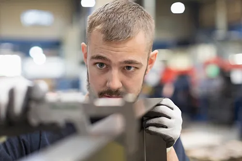 Machining parts on a converyor belt