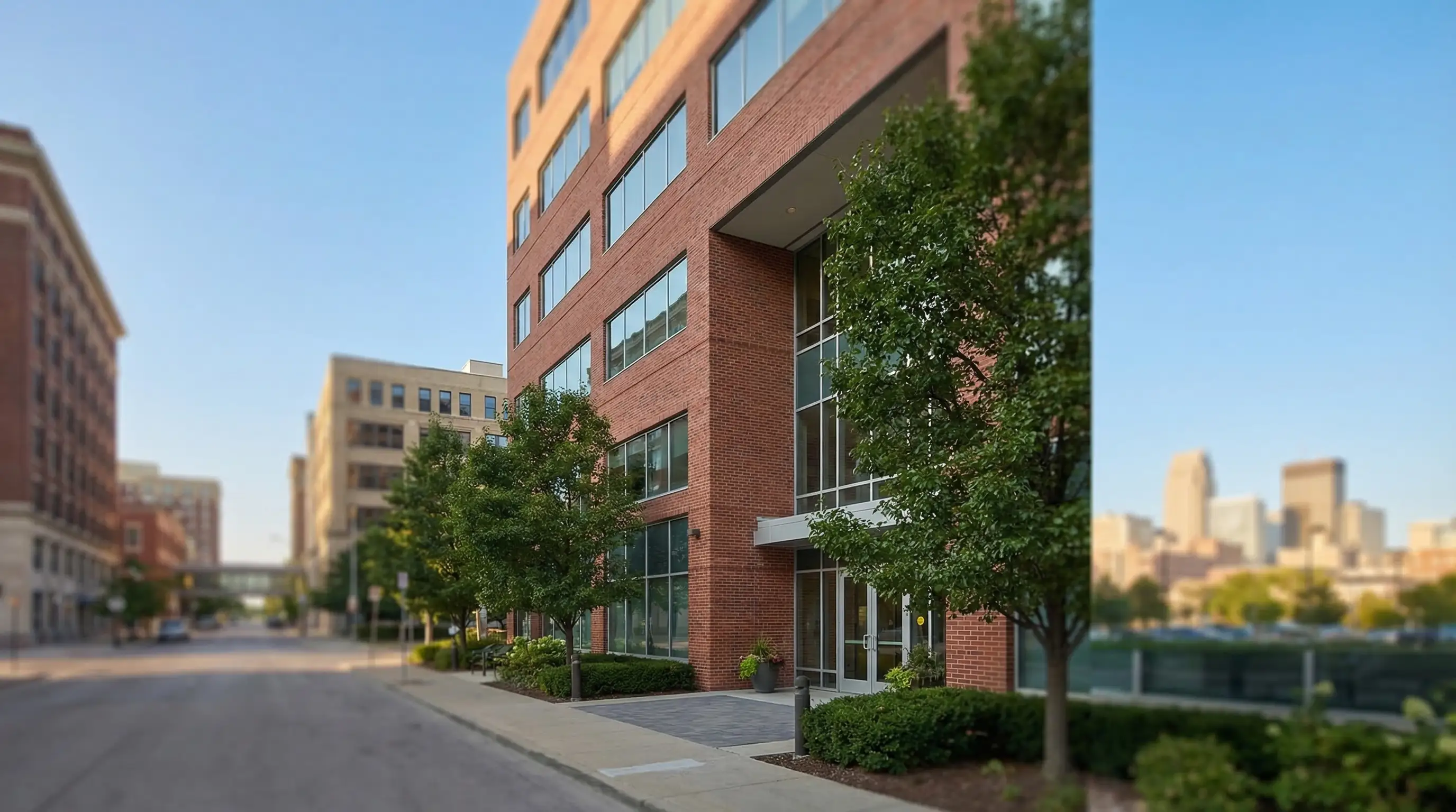 Professional law office consultation room with attorney and clients in Omaha, NE