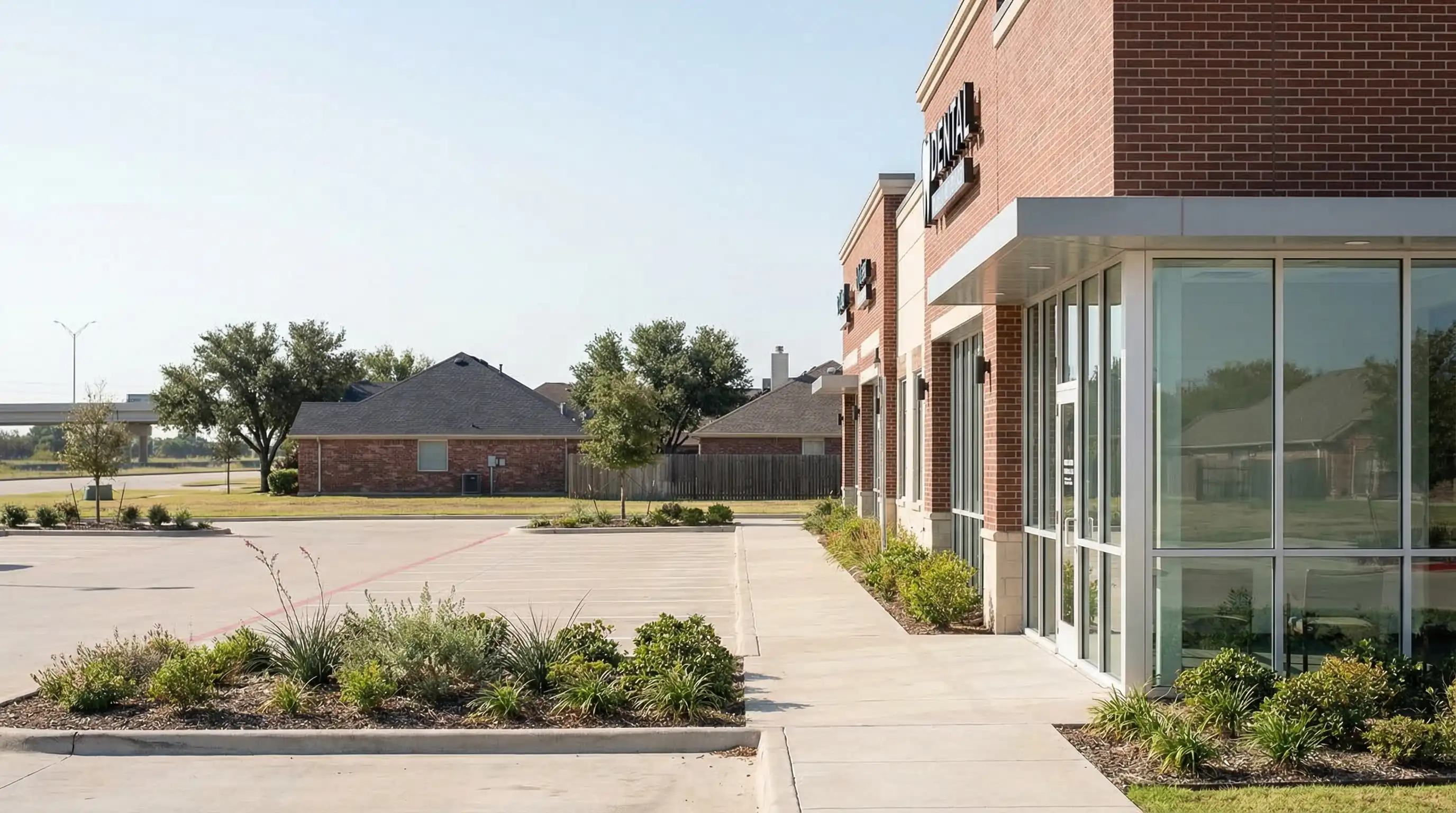 Dentist reviewing treatment plan with a patient in a modern Arlington TX dental practice operatory