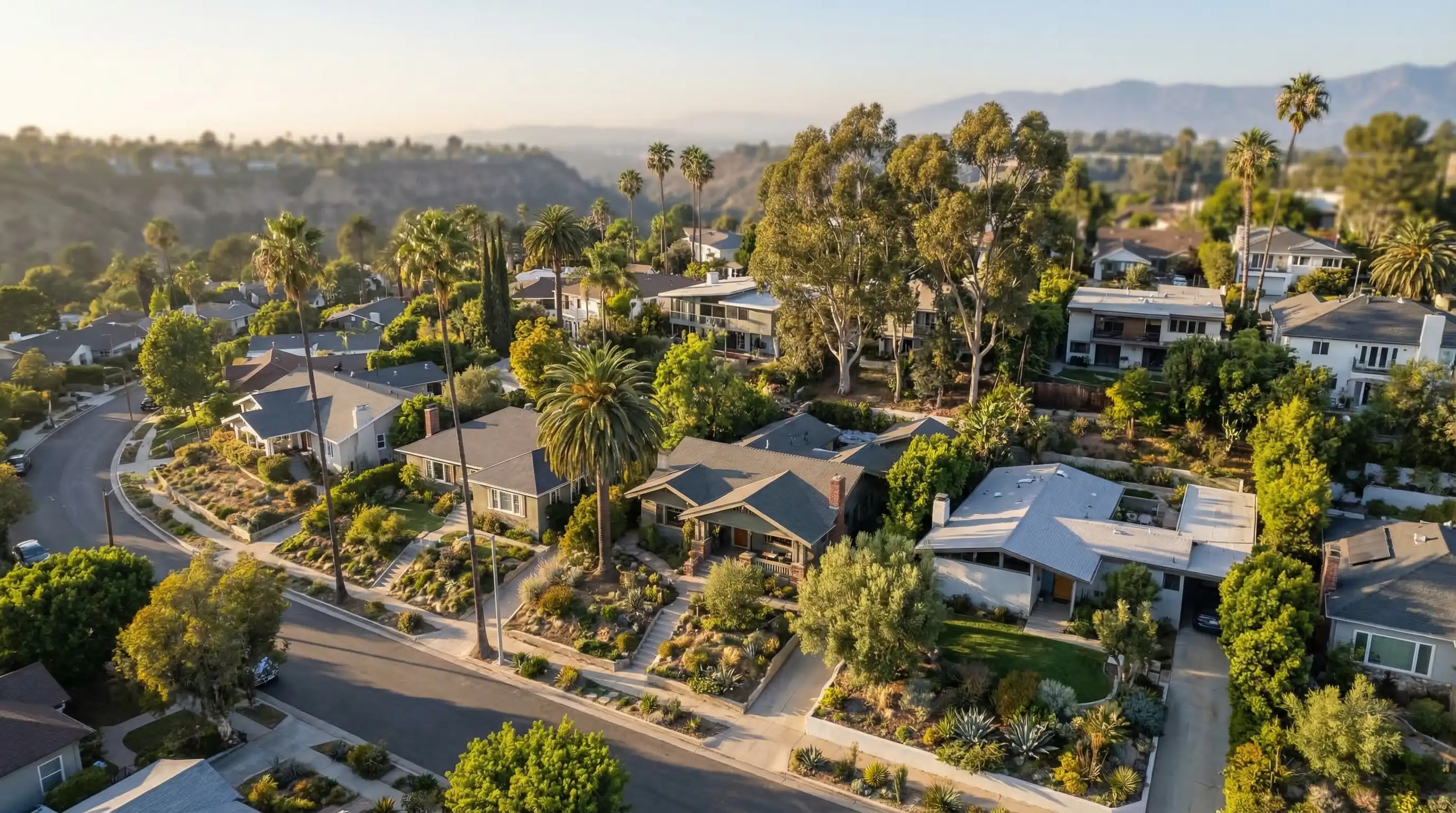 Real estate agent showing a craftsman bungalow with canyon views to buyers in Silver Lake neighborhood, Los Angeles, CA