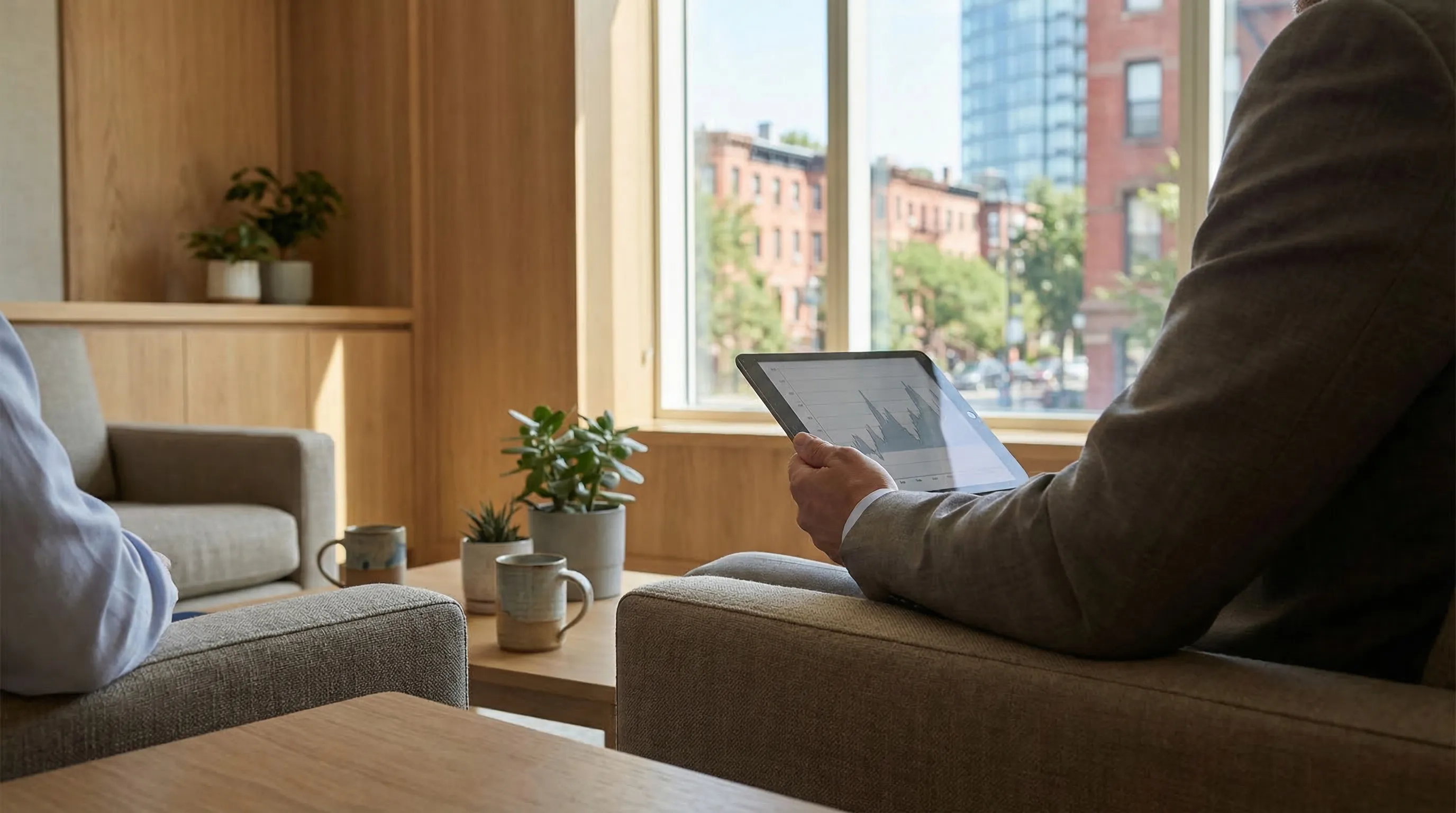 Modern private medical practice exterior on a tree-lined street in Boston, MA