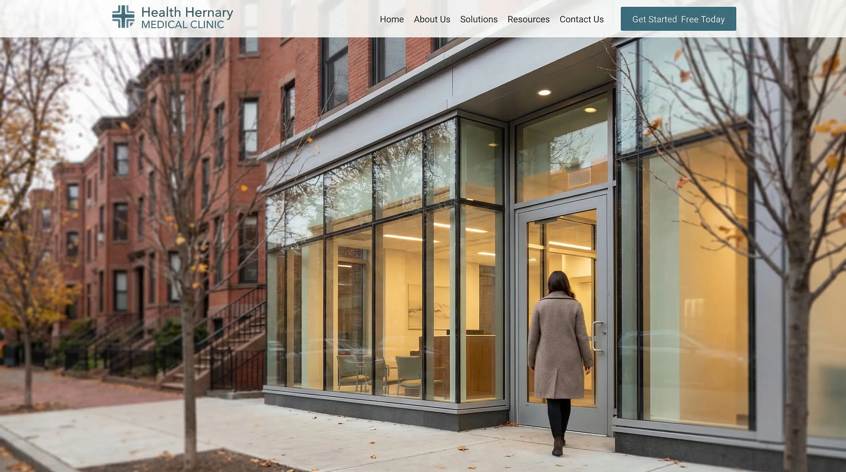 Modern private medical practice exterior on a tree-lined street in Boston, MA