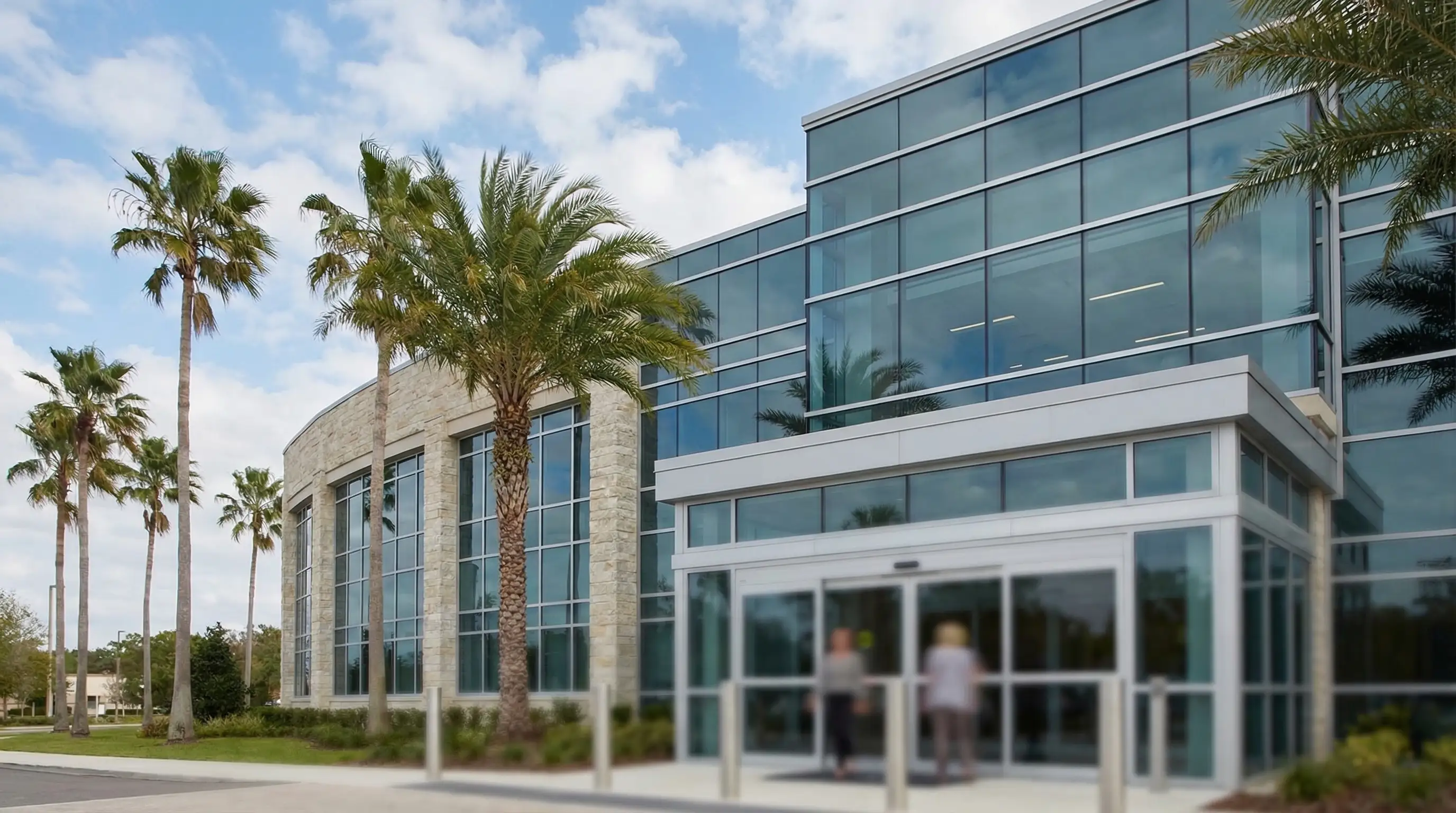 Friendly physician consultation with a patient in a modern Lakeland, FL independent medical practice exam room