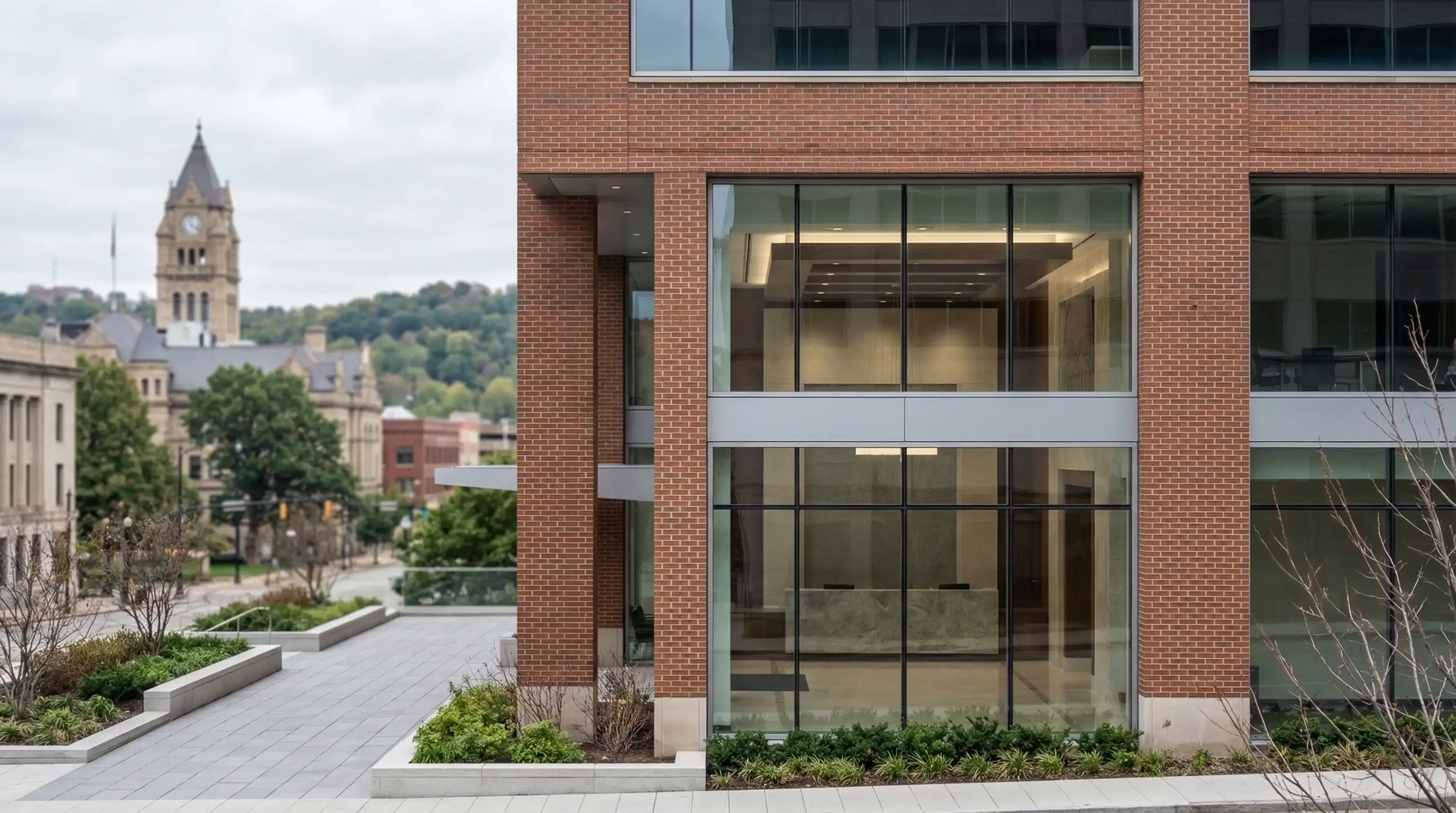 Personal injury attorney consultation room in a professional Akron, OH law office with Summit County Courthouse visible