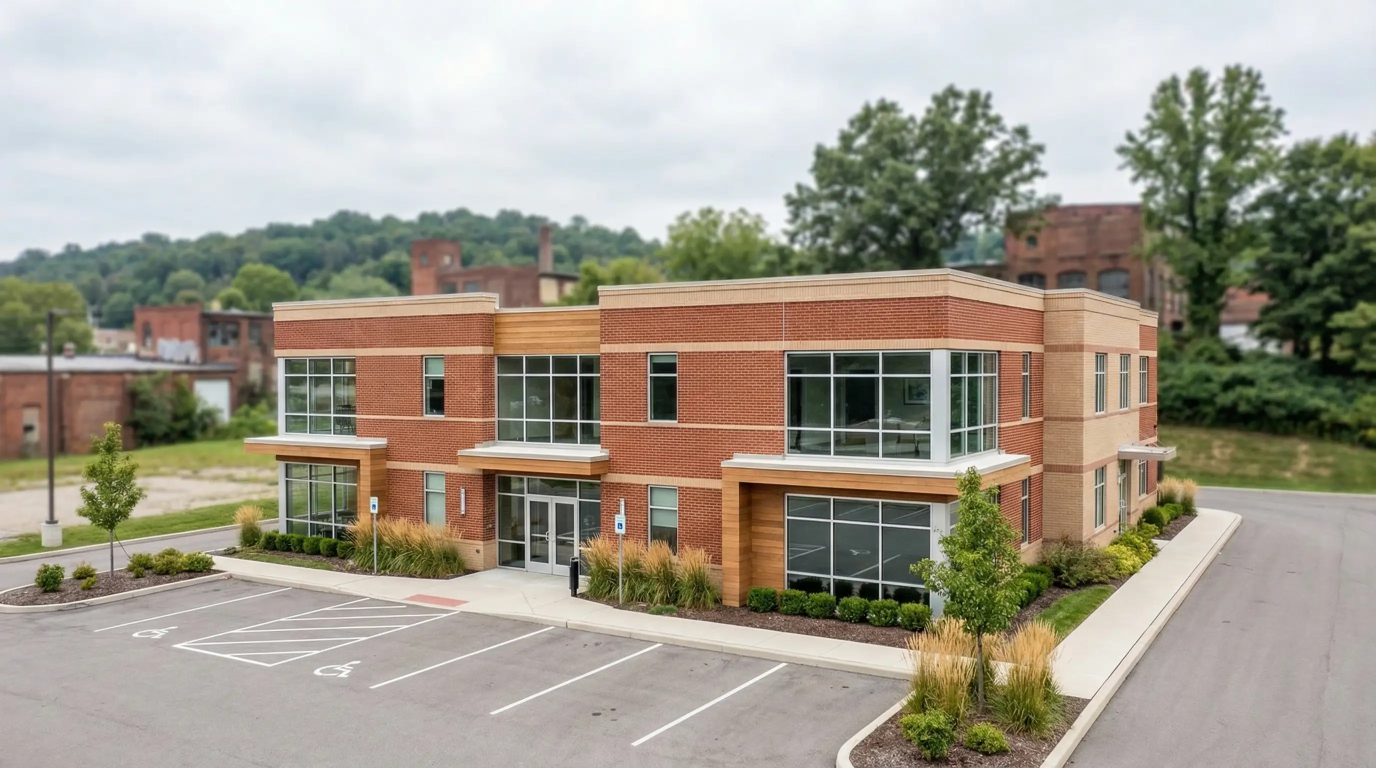 Dentist reviewing dental work with a patient in a modern dental office in Akron, OH