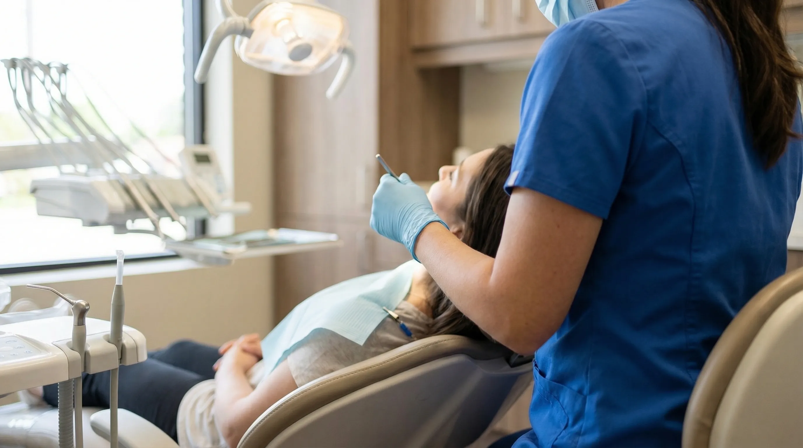 Modern dental office reception area with welcoming decor and professional staff in Syracuse, NY
