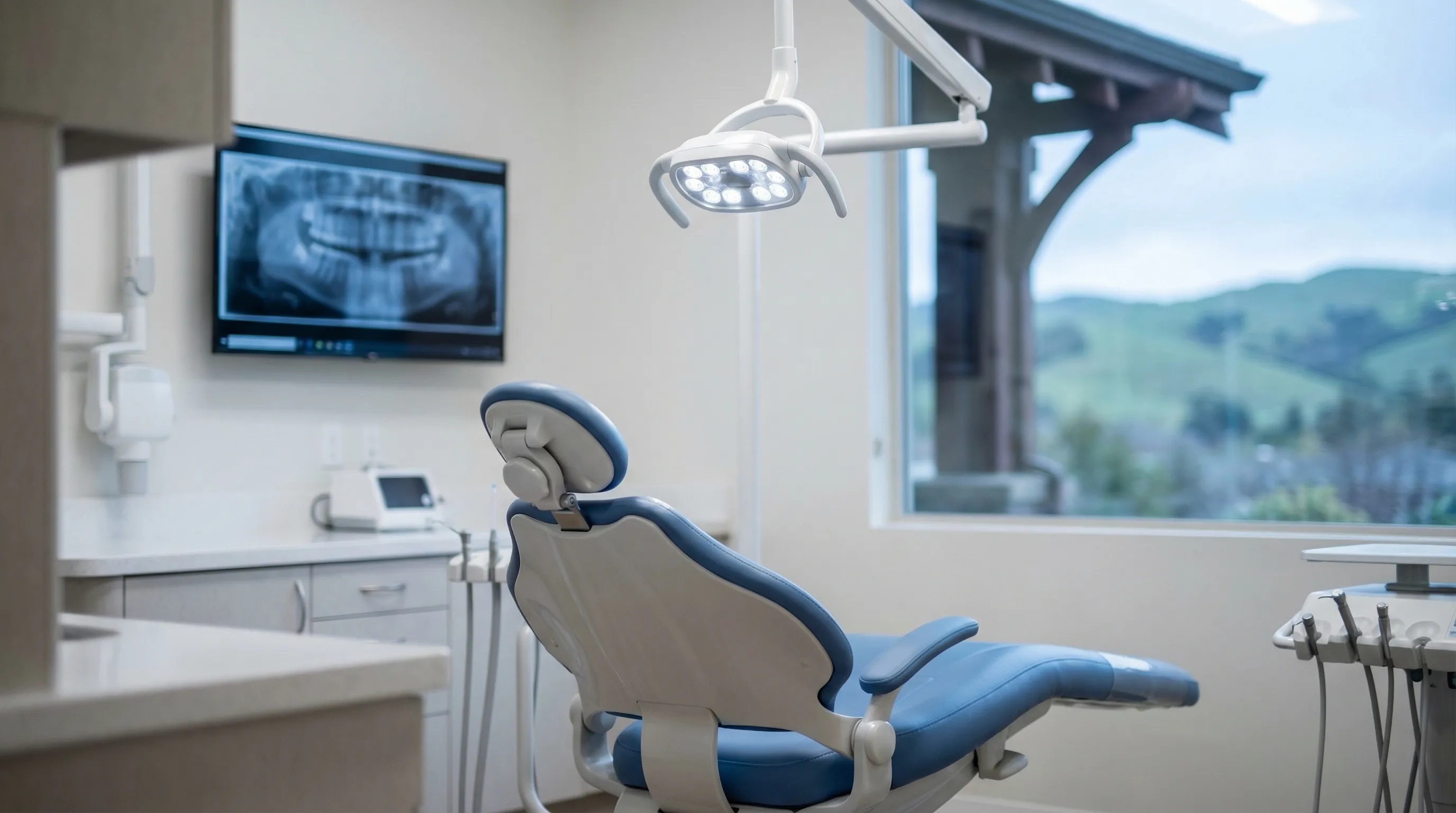 Modern dental treatment room with Oakland dentist and patient in Temescal neighborhood practice, Oakland, CA