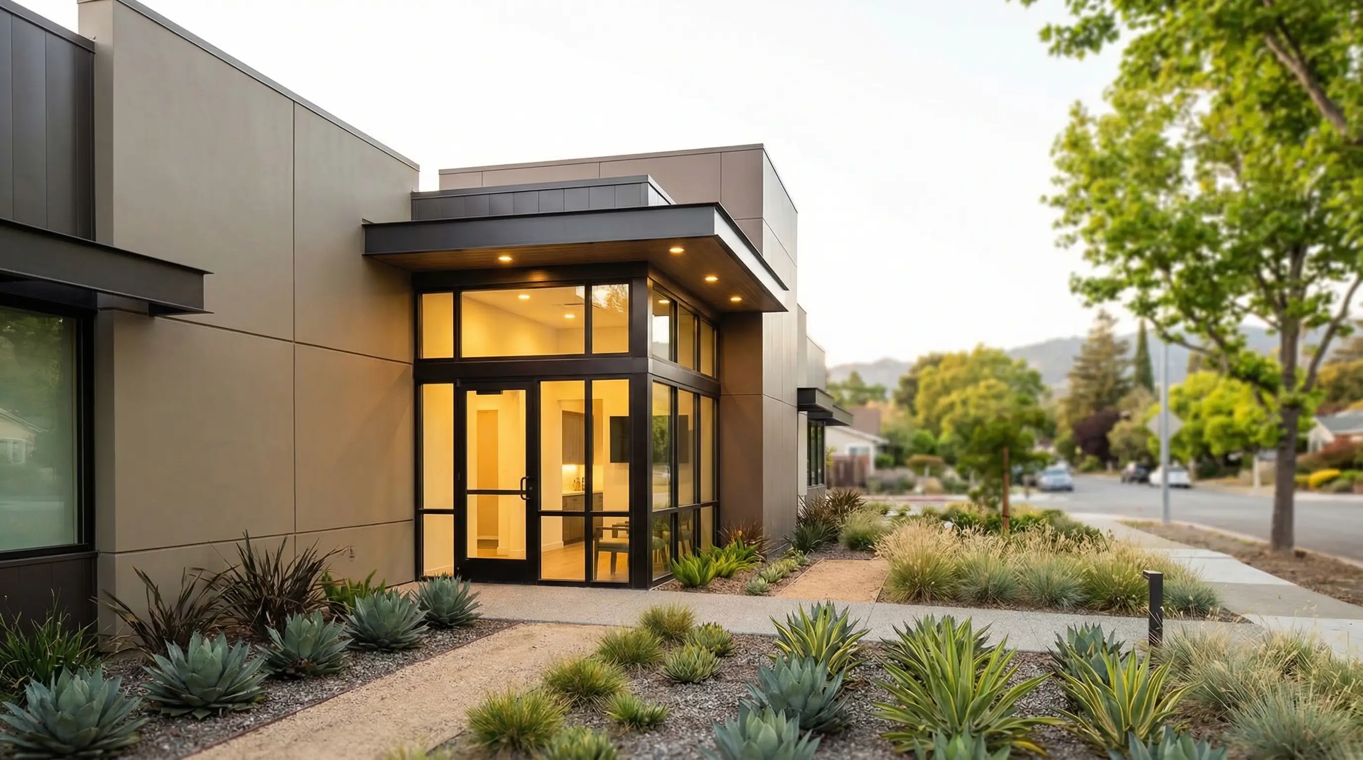 Modern dental office interior in San Jose, CA with dentist and patient during consultation in bright professional treatment room
