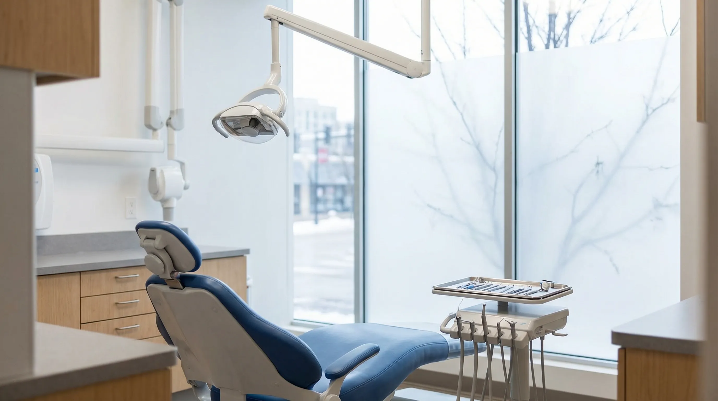 Modern dental consultation room in a Madison, WI dental practice with professional dentist reviewing treatment plan with patient