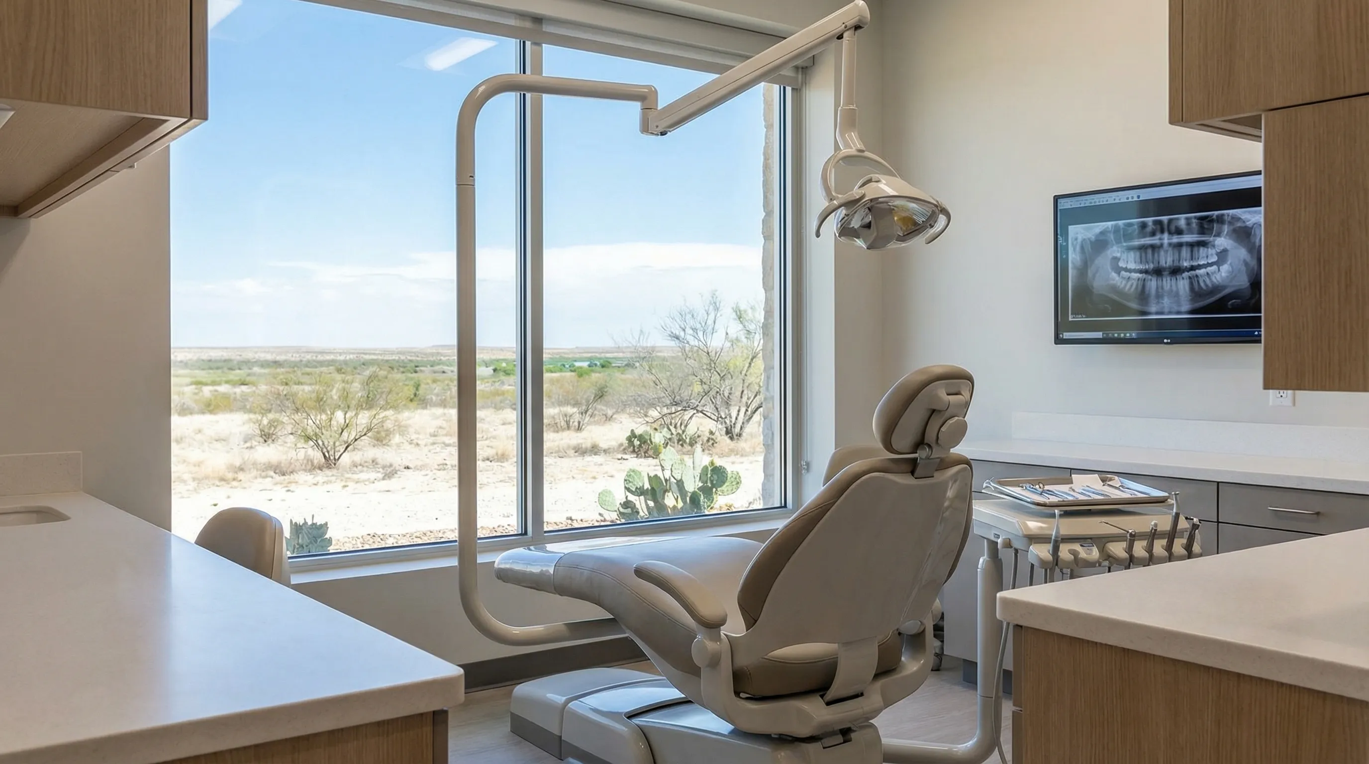 Modern dental treatment room in a Laredo, TX dental practice with bilingual patient materials visible