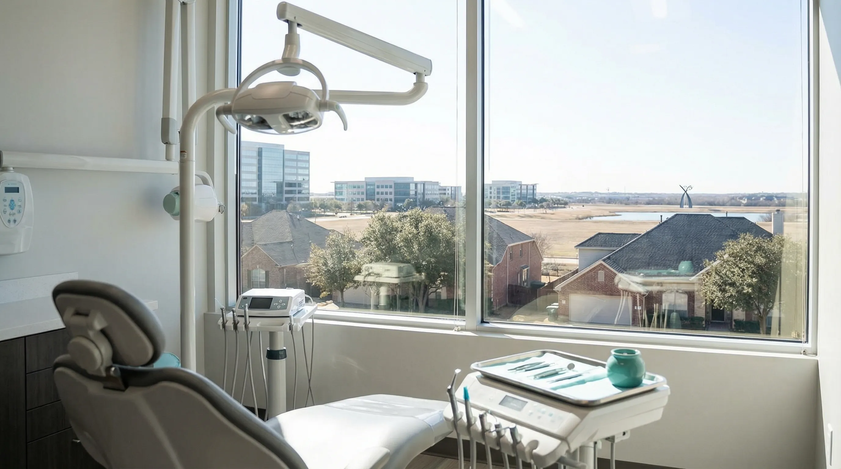 Modern dental treatment room with dentist and patient in Irving, TX dental clinic serving Las Colinas community