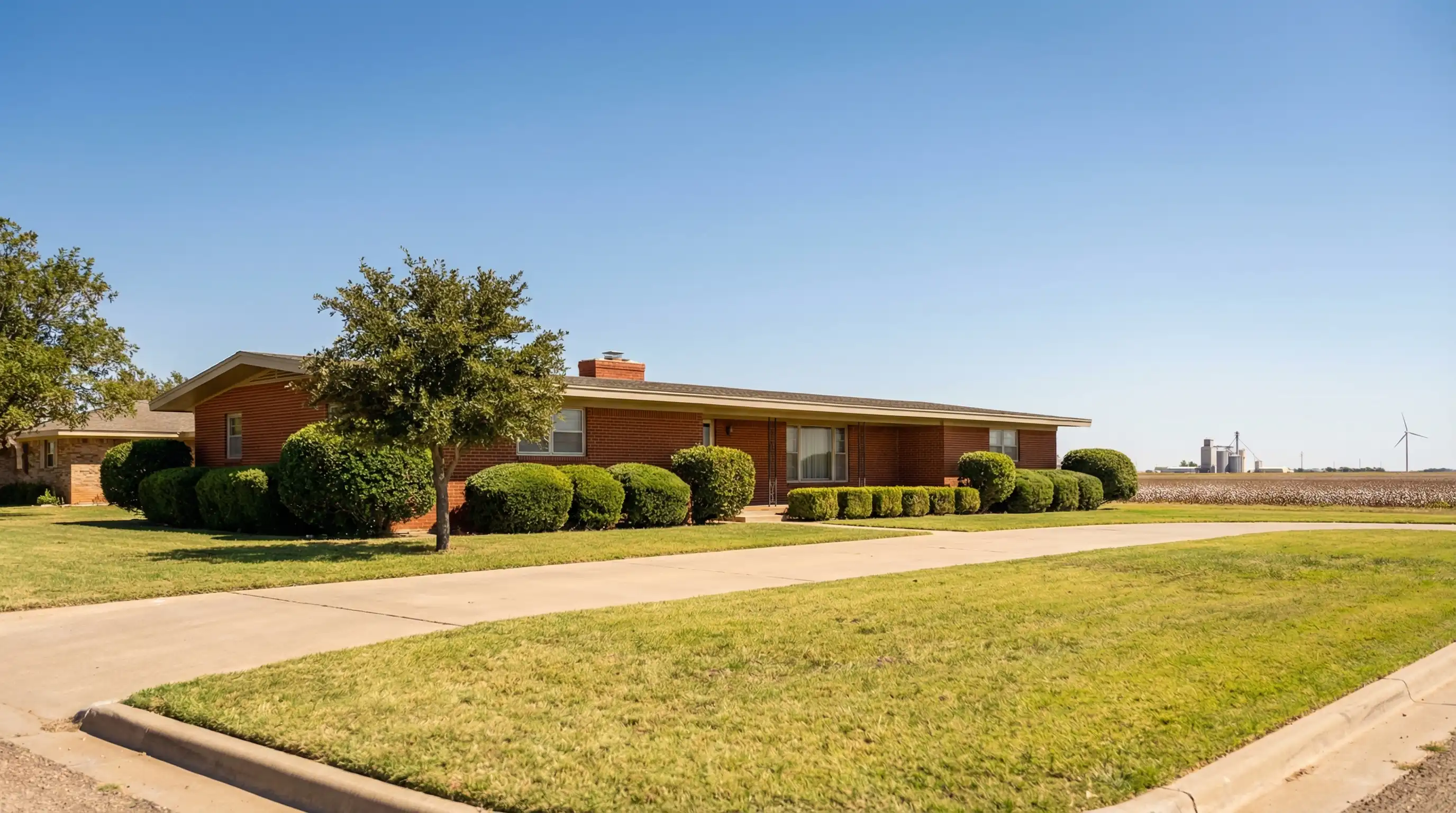 Real estate agent consulting with clients about home purchase in Lubbock, TX neighborhood