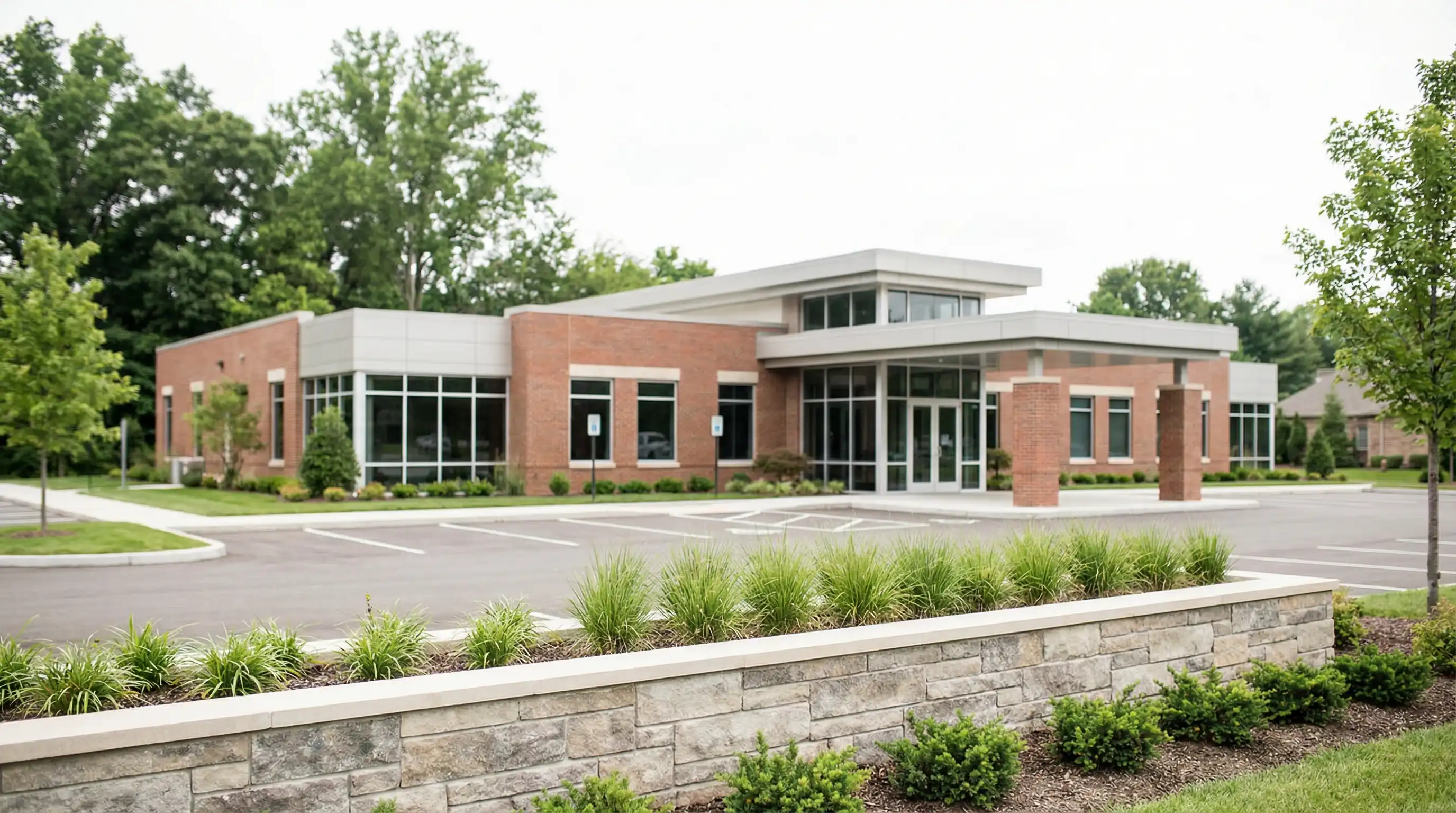 Professional dentist and hygienist working with a patient in a modern dental office in Des Moines, IA