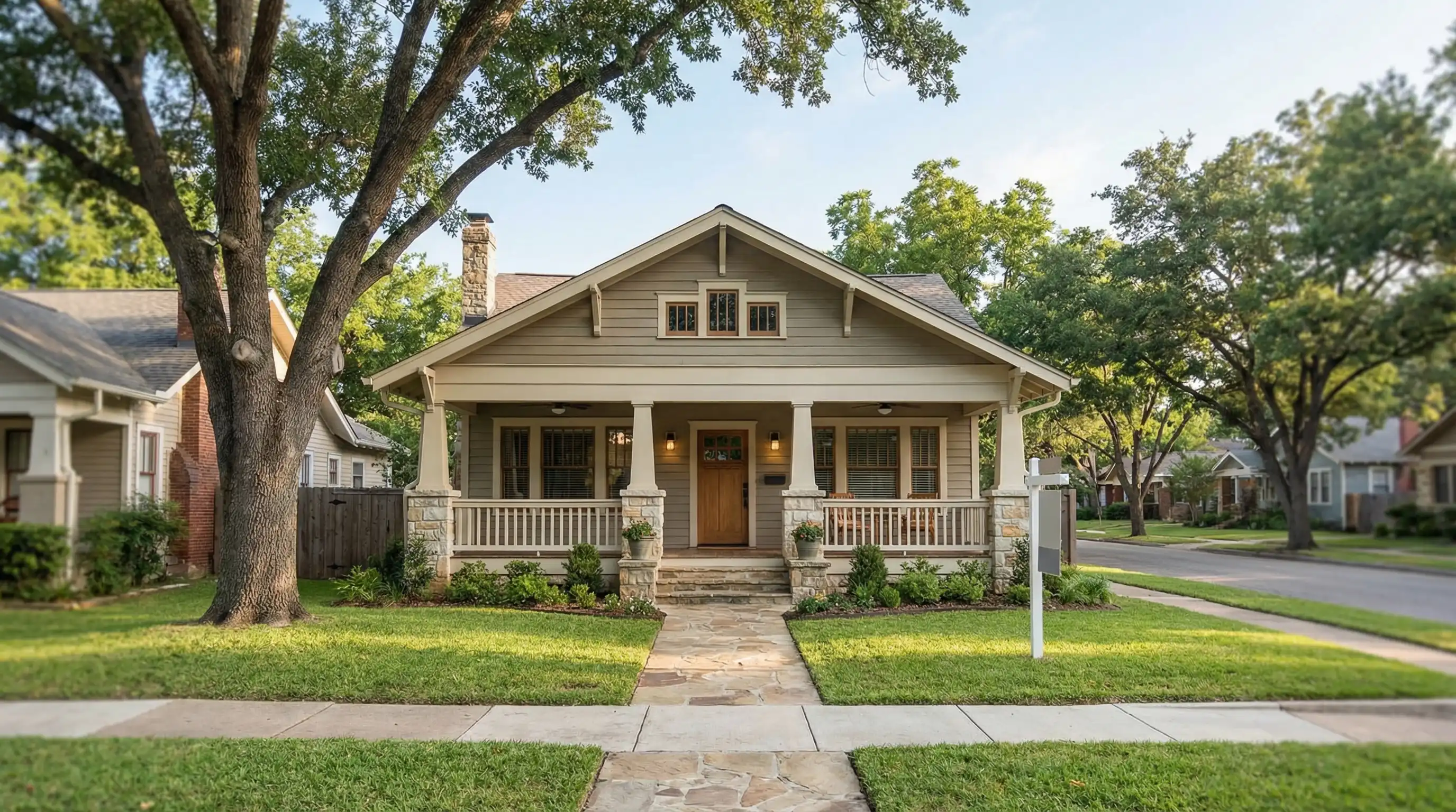 Real estate agent reviewing home listings with clients in Springfield, MO office